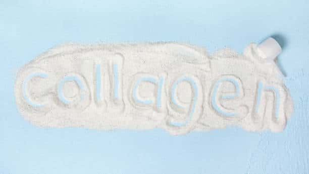 blue background with collagen powder close up