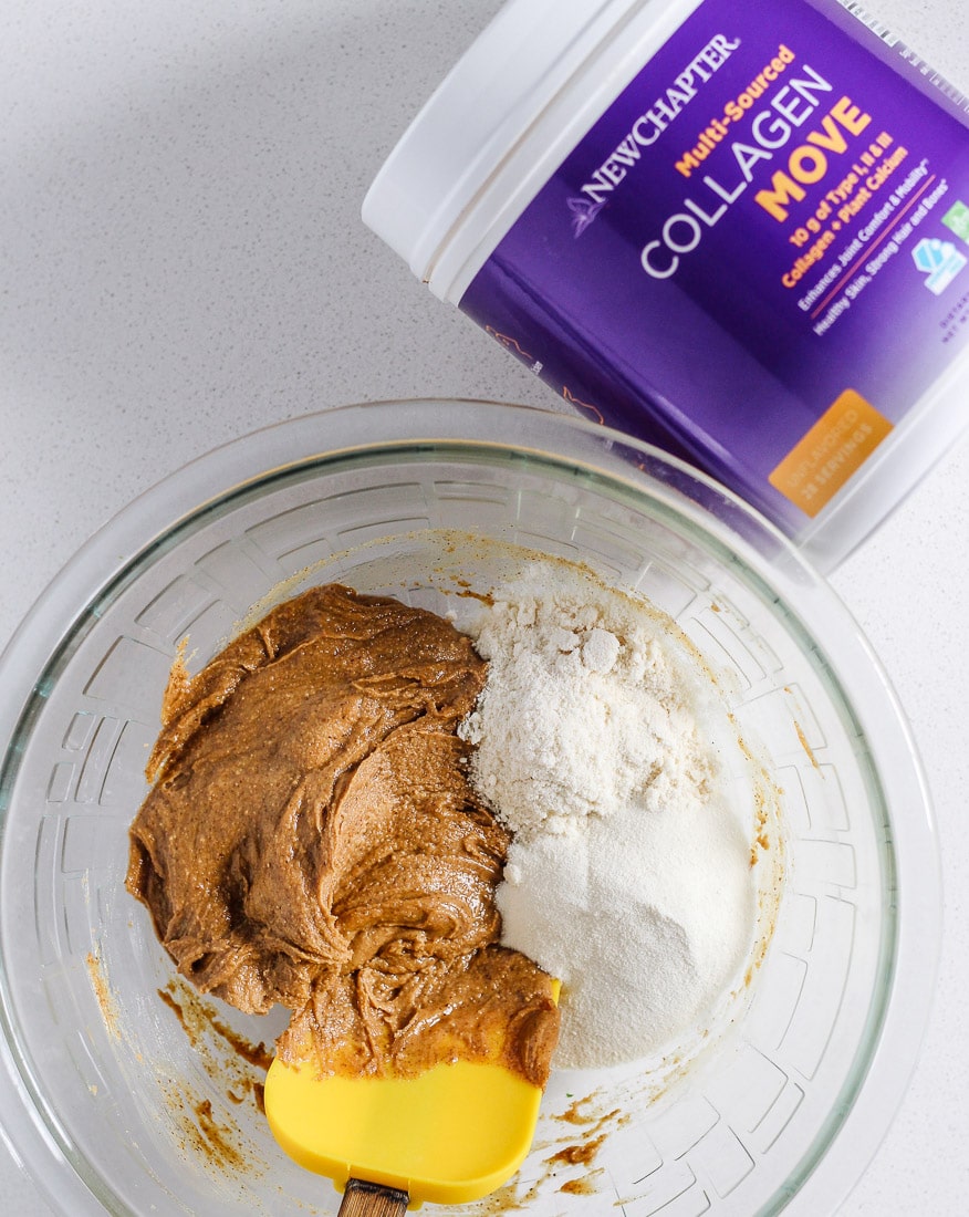 Homemade perfect bar ingredients in a mixing bowl next to a tub of New Chapter Collagen powder.